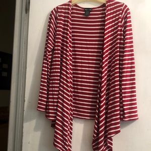 Cute Wet Seal jacket with shark bite tails in front. Long sleeves.